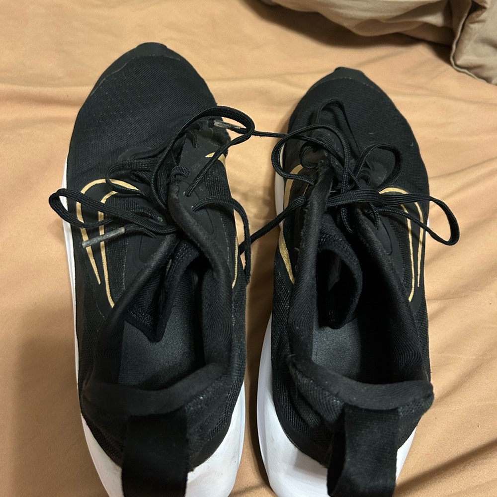 Nike Black and Gold Sneakers